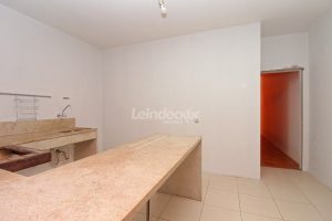 Casa à venda com 286m², 3 dormitórios, 1 suíte, 6 vagas no bairro Auxiliadora em Porto Alegre - Foto 17
